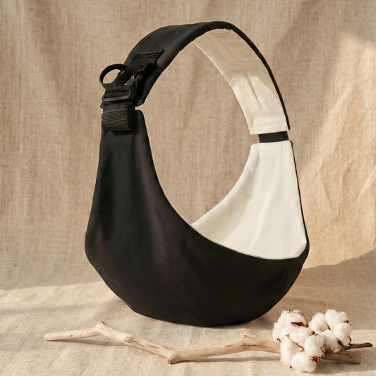 Black print toddler hip carrier for ergonomic back support, dispatched from Auckland NZ
