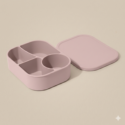 Blush Petal light pink BPA-free silicone bento box displaying a deep round compartment for snacks and leakproof edge sealing